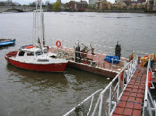 The pontoon at high tide with boats moored