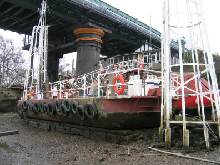 The pontoon at low tide resting on the riverbed